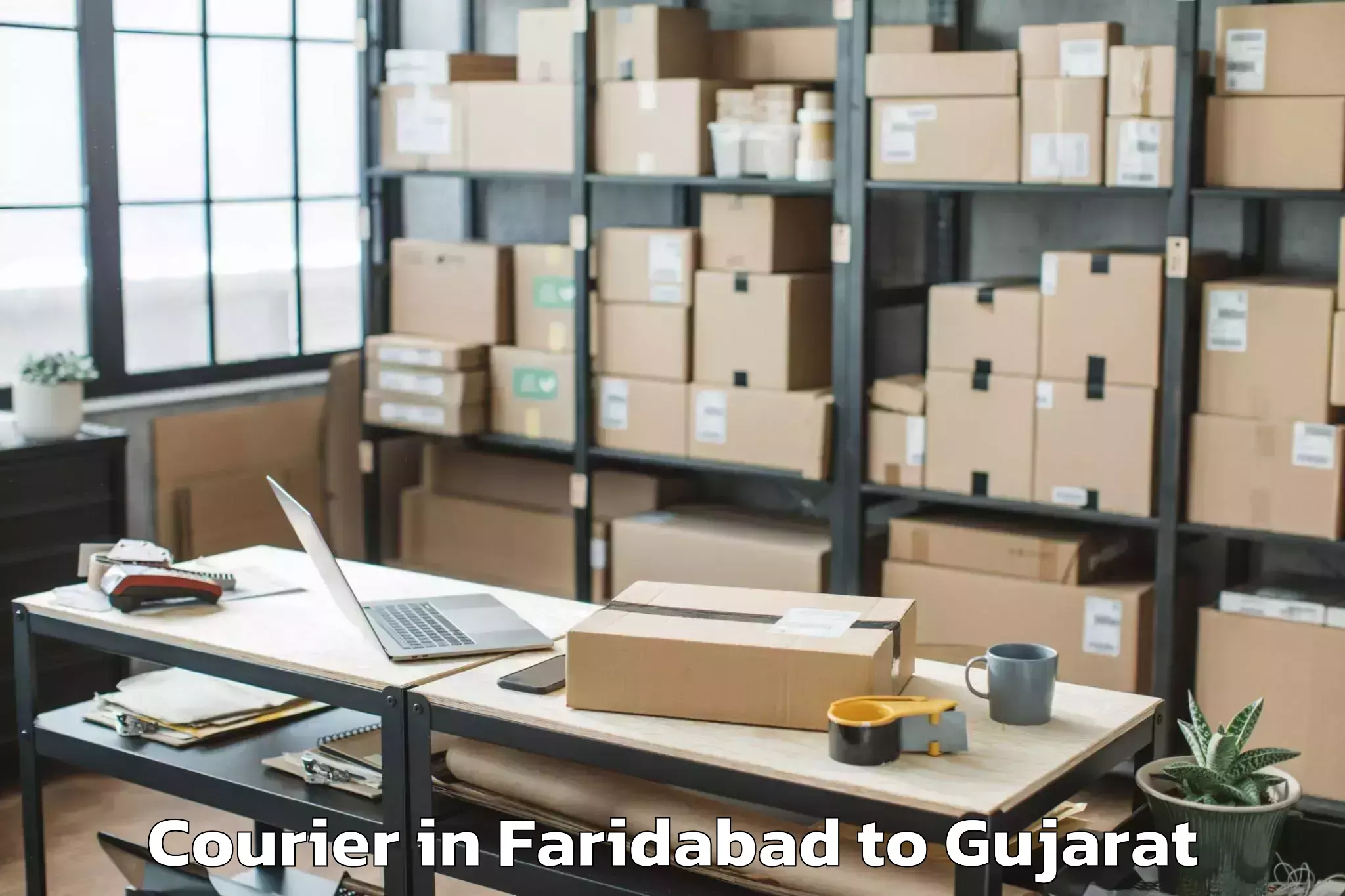 Book Faridabad to Mangrol Courier